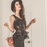 Style blogger Elle-May Leckenby wears hers with a sheer silk top